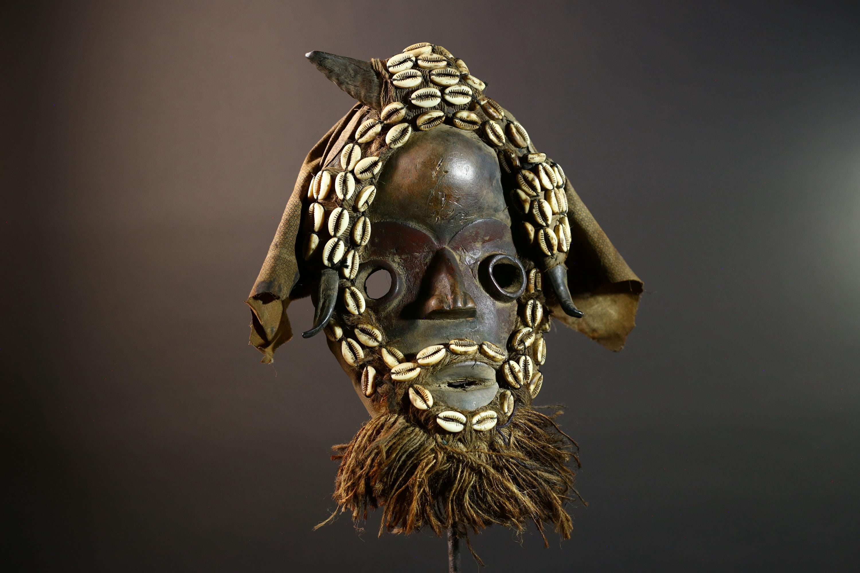 African Dan Mask Handcrafted Tribal Wood Wall Decor Authentic Cultural Art Sculpture with Cowrie Shells and Raffia Beard-G5693