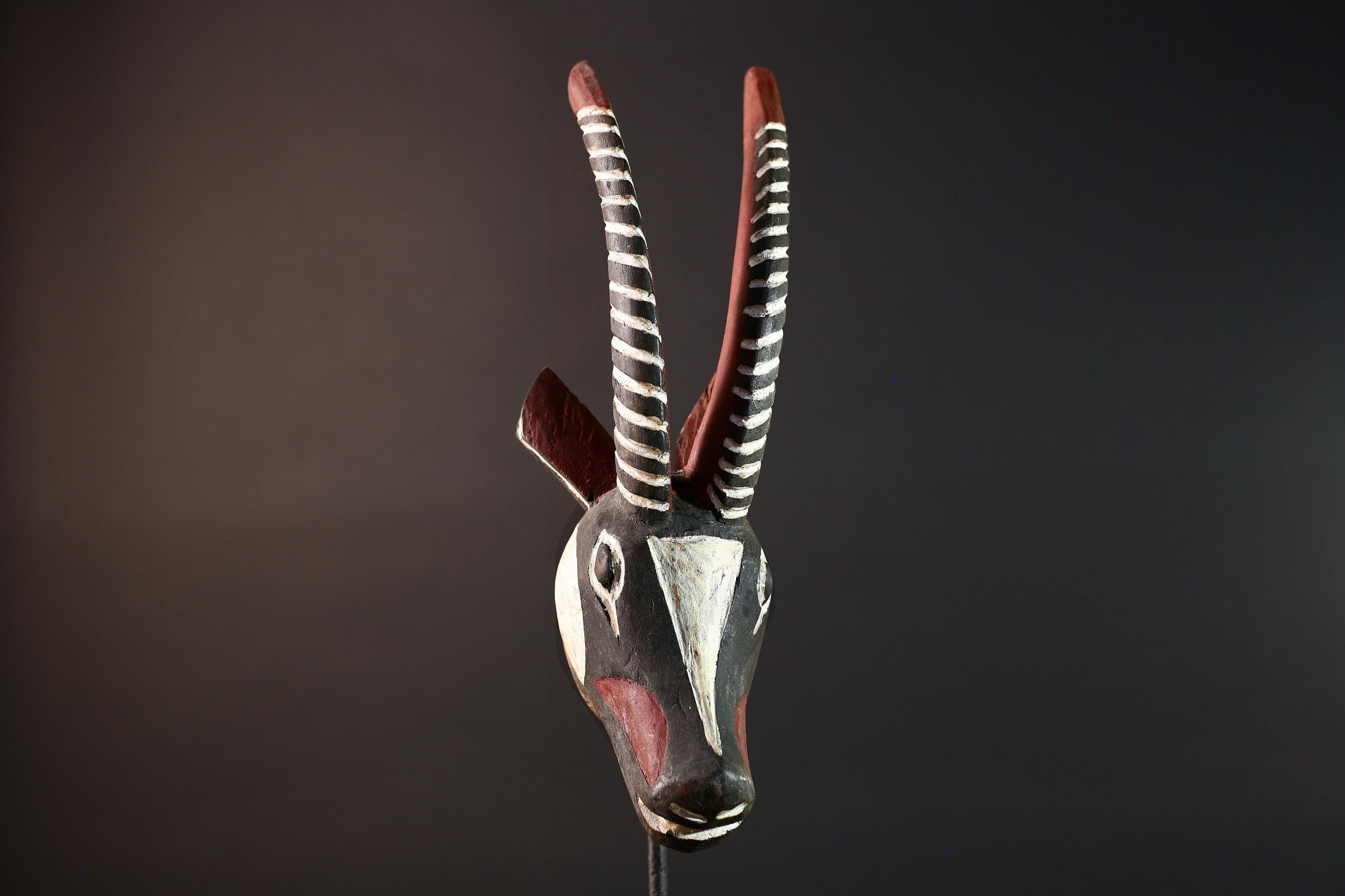 African antelope mask tribal animal head with striped horn and red black white painted wood Bobo Bamana style wall decor sculpture G5568