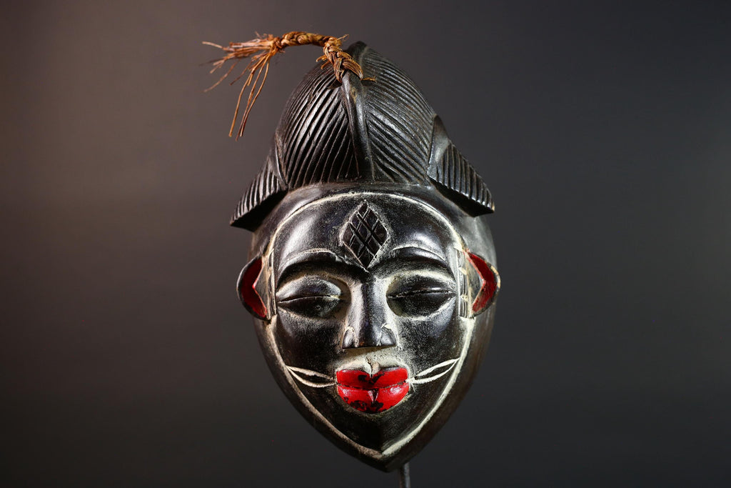 Punu tribal carving with red lips, black wood mask with fiber crest, ancestral spirit face art, African wall decor sculpture G5570