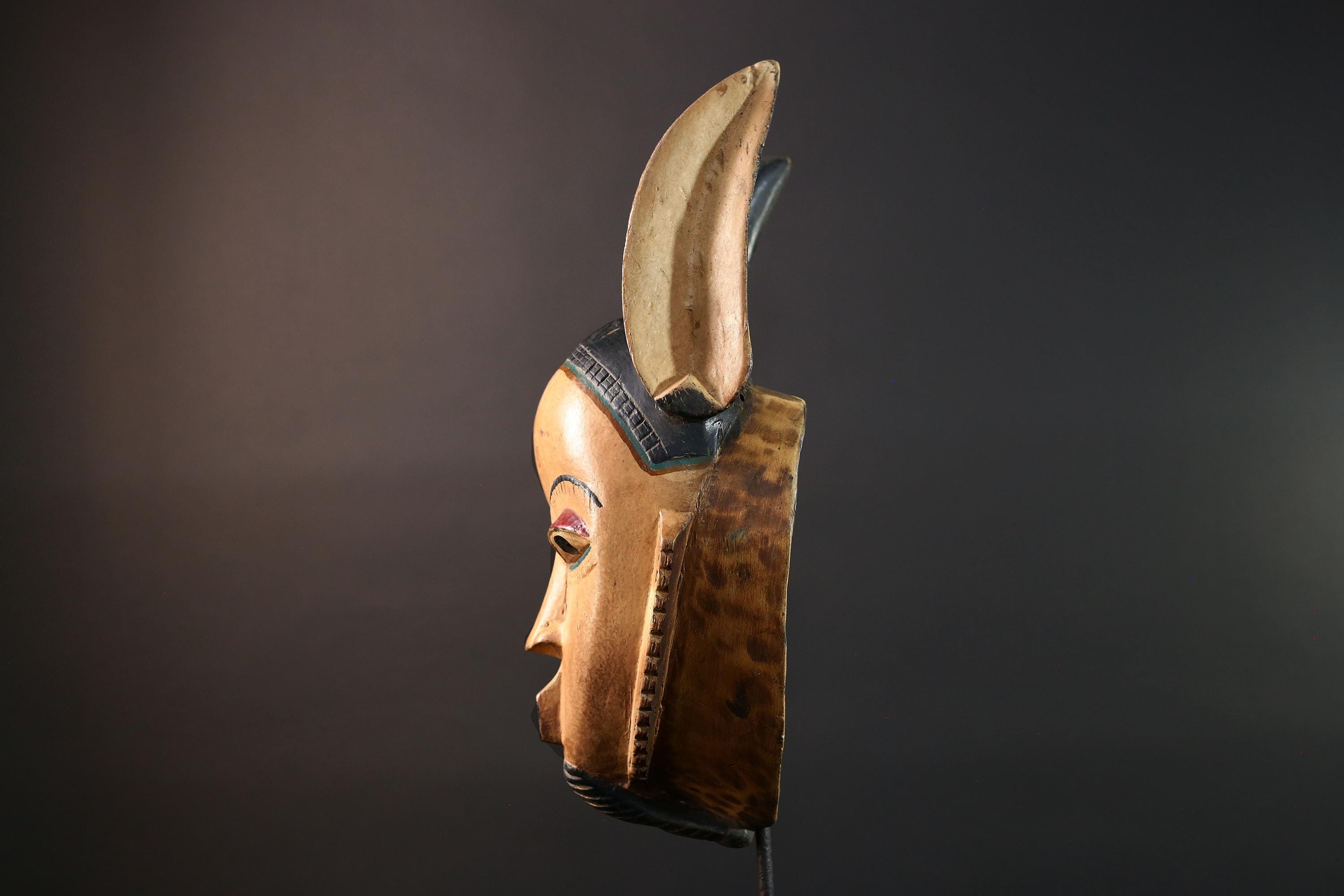 African mask Kwele tribal wall decor with curved horns carved face art collectible home accent heart shaped portrait carving G5571