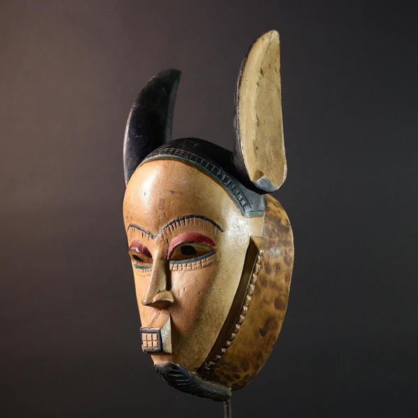 African mask Kwele tribal wall decor with curved horns carved face art collectible home accent heart shaped portrait carving G5571