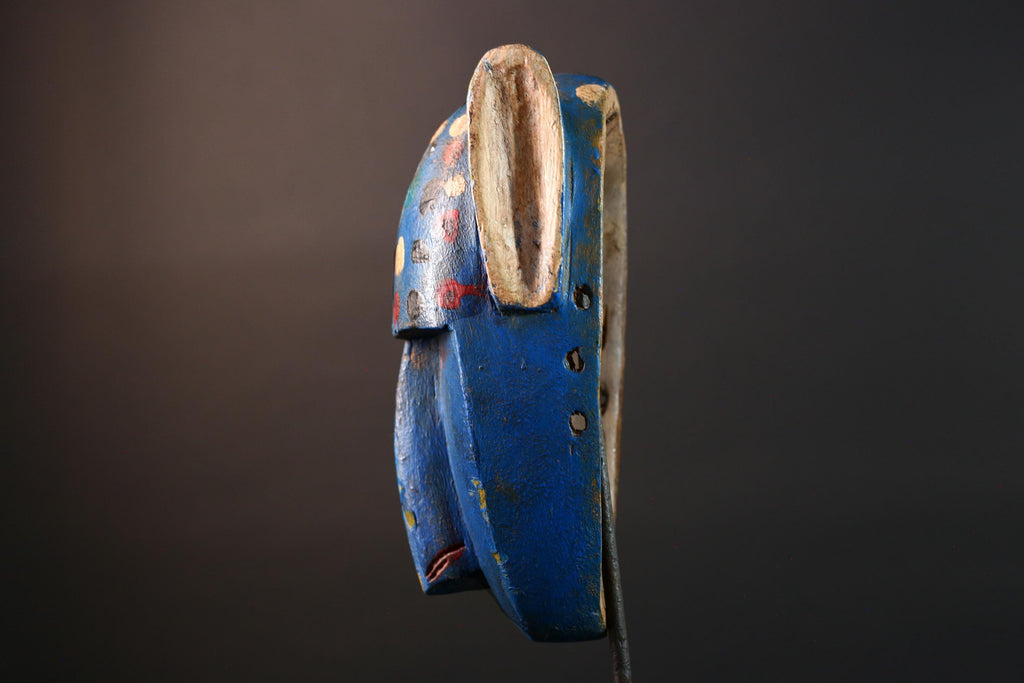 African mask Bwa spirit animal with long snout, blue painted surface, carved ears, and multicolor dotted tribal finish wall decor G5574