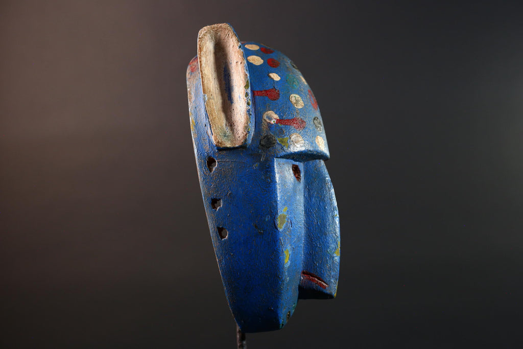 African mask Bwa spirit animal with long snout, blue painted surface, carved ears, and multicolor dotted tribal finish wall decor G5574