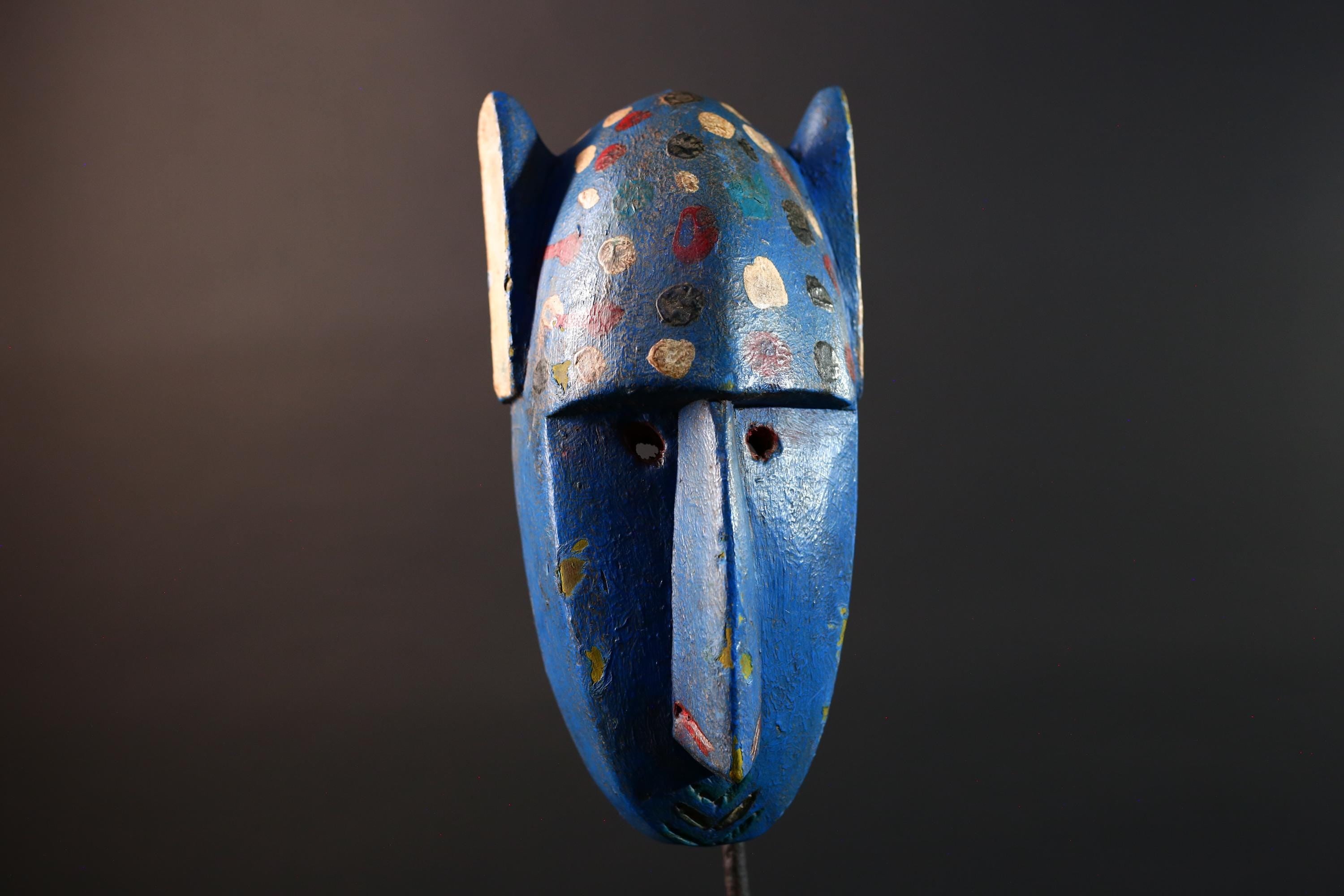 African mask Bwa spirit animal with long snout, blue painted surface, carved ears, and multicolor dotted tribal finish wall decor G5574