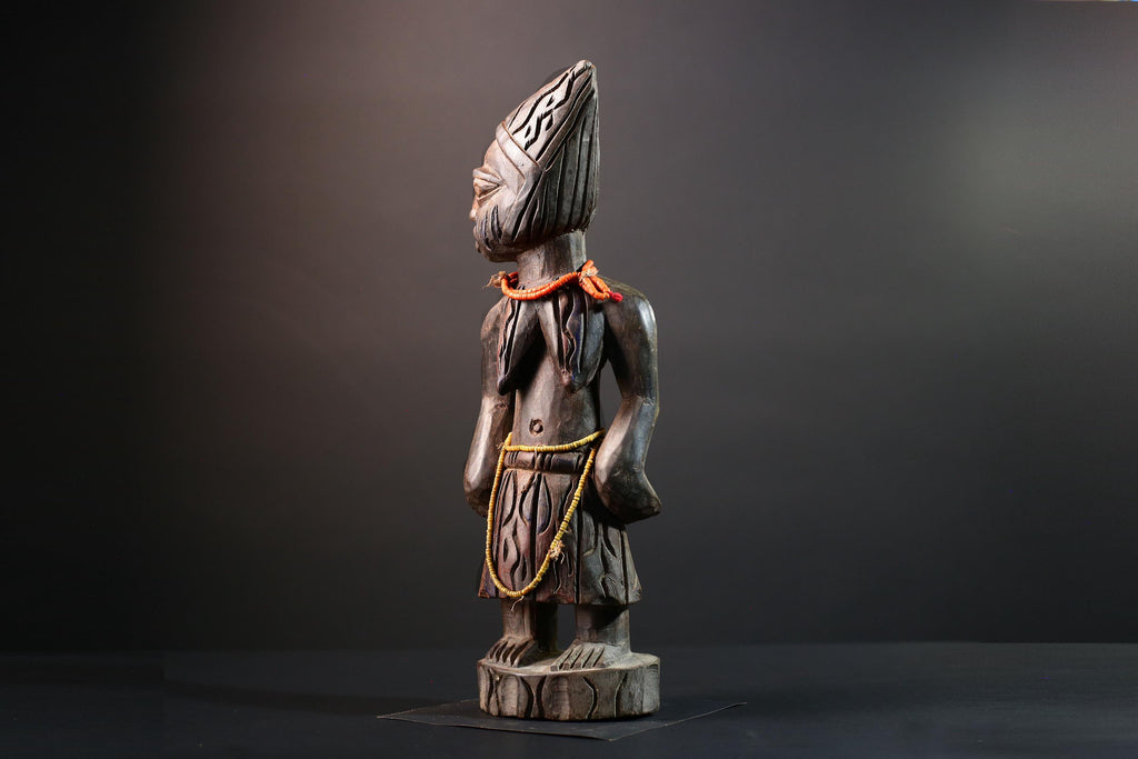 African statue Yoruba carved female figure from Nigeria with beads, tribal details, and dark finish for spiritual home decor G5561
