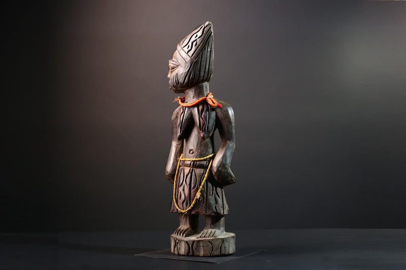 African statue Yoruba carved female figure from Nigeria with beads, tribal details, and dark finish for spiritual home decor G5561