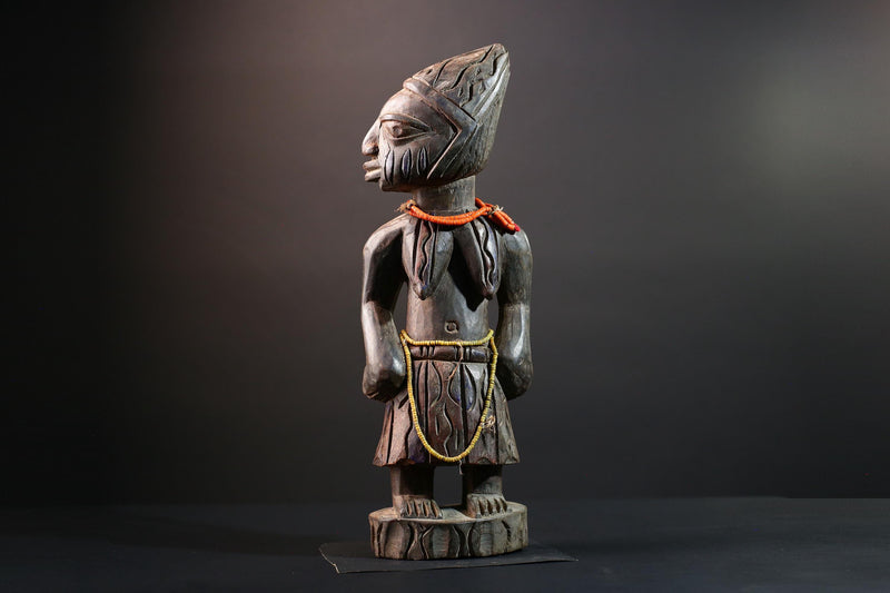 African statue Yoruba carved female figure from Nigeria with beads, tribal details, and dark finish for spiritual home decor G5561