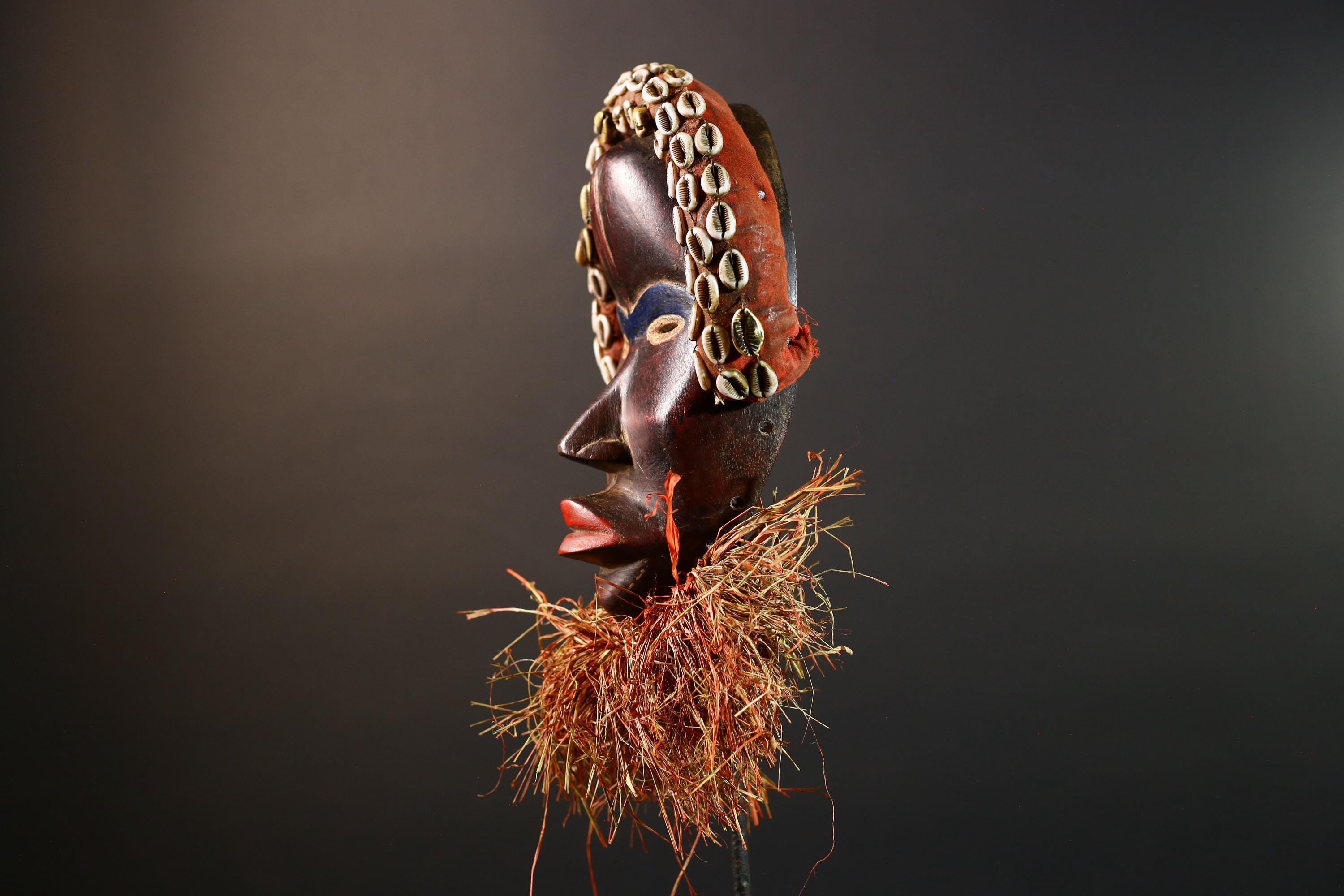 African Cowrie Mask Raffia Beard Mask Tribal Wall Decor Handcrafted Wood Mask Ethnic Home Accent Wooden Artwork Mask Unique Mask-G5698