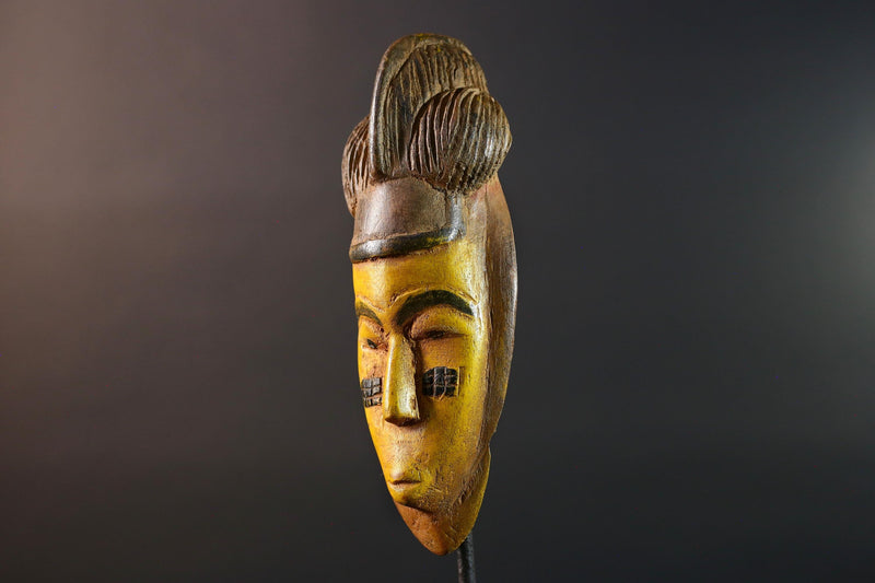 African mask Baule yellow wall sculpture tribal face carving cultural artifact leaf crest decor artisan African wood art piece G5565
