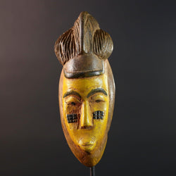 African mask Baule yellow wall sculpture tribal face carving cultural artifact leaf crest decor artisan African wood art piece G5565