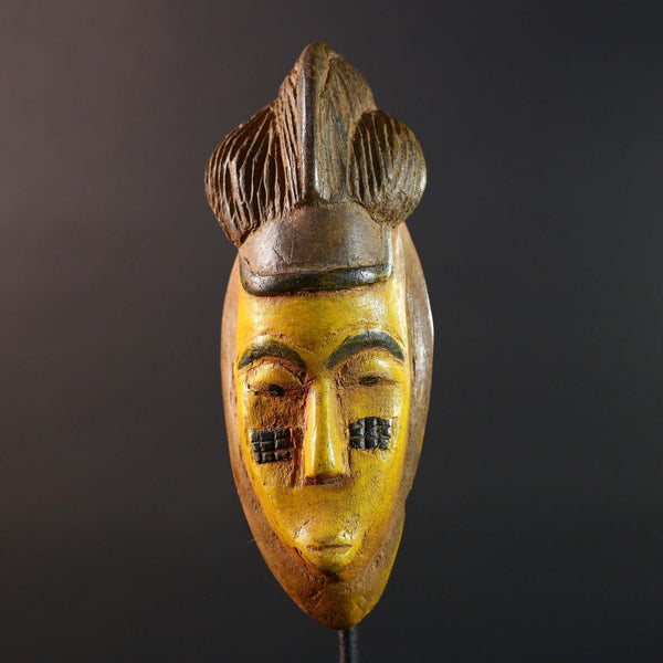 African mask Baule yellow wall sculpture tribal face carving cultural artifact leaf crest decor artisan African wood art piece G5565