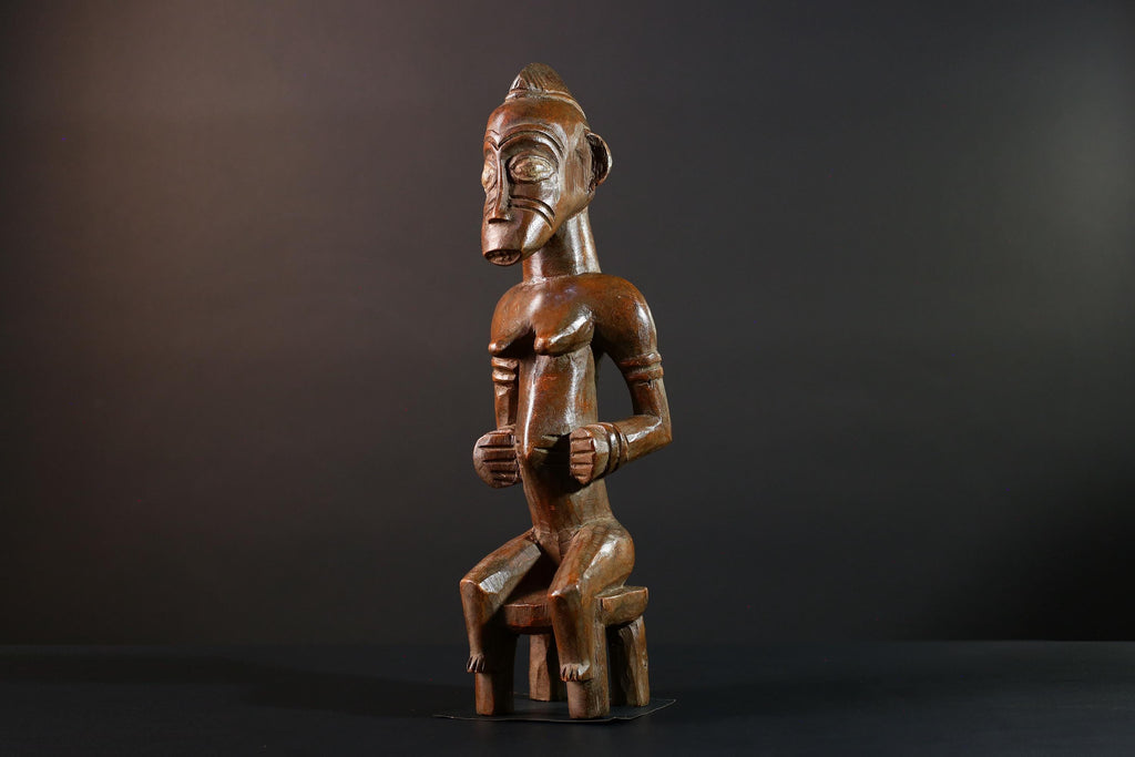 African Yoruba female figure seated on stool carved tribal fertility sculpture from Nigeria altar decor spiritual wood art-G5640
