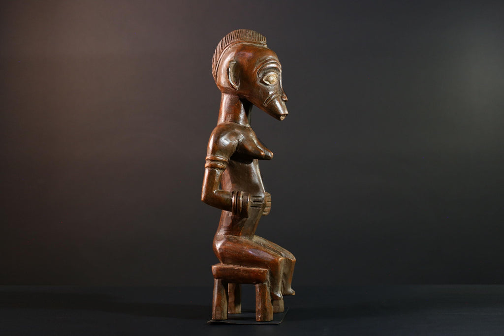 African Yoruba female figure seated on stool carved tribal fertility sculpture from Nigeria altar decor spiritual wood art-G5640
