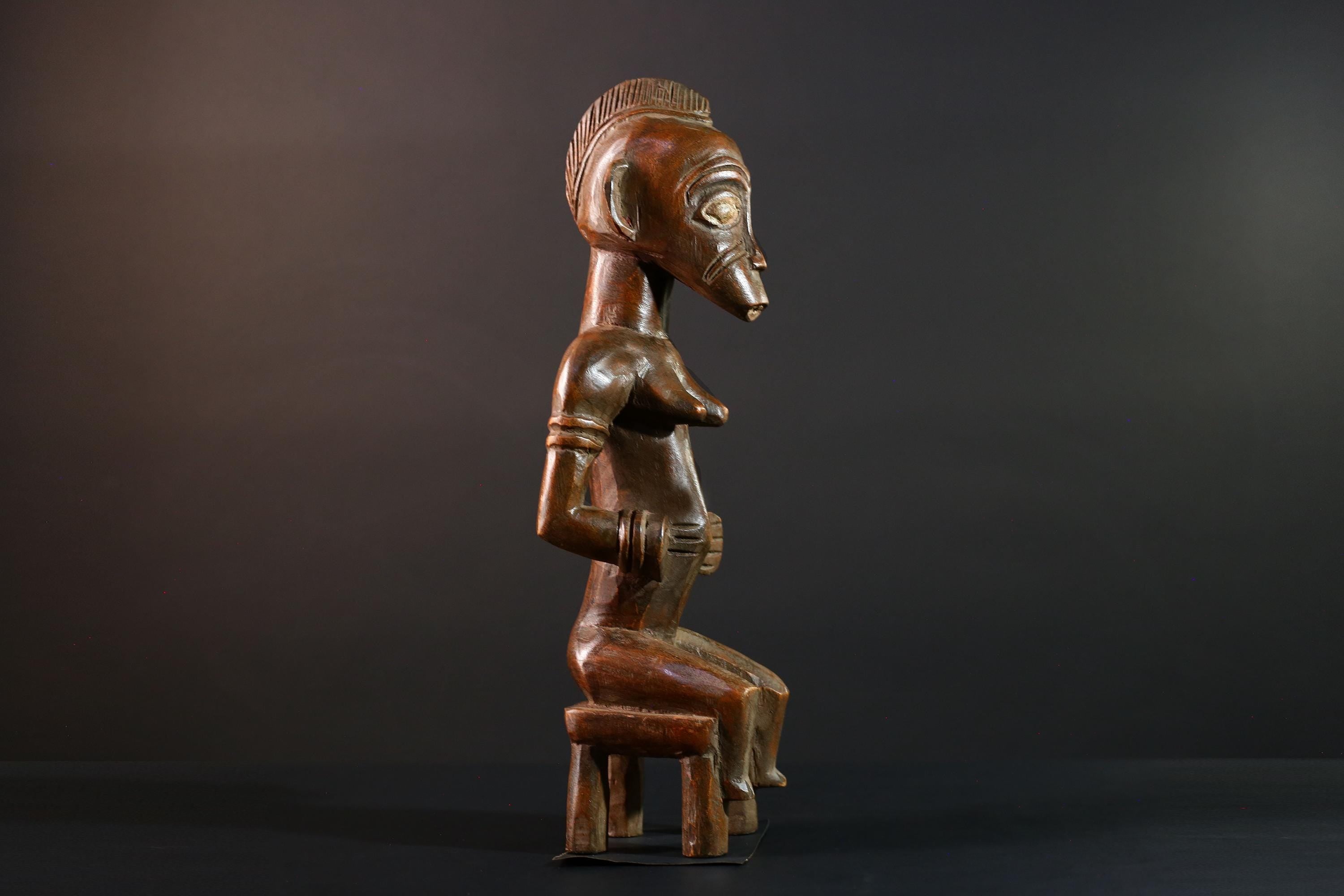 African Yoruba female figure seated on stool carved tribal fertility sculpture from Nigeria altar decor spiritual wood art-G5640