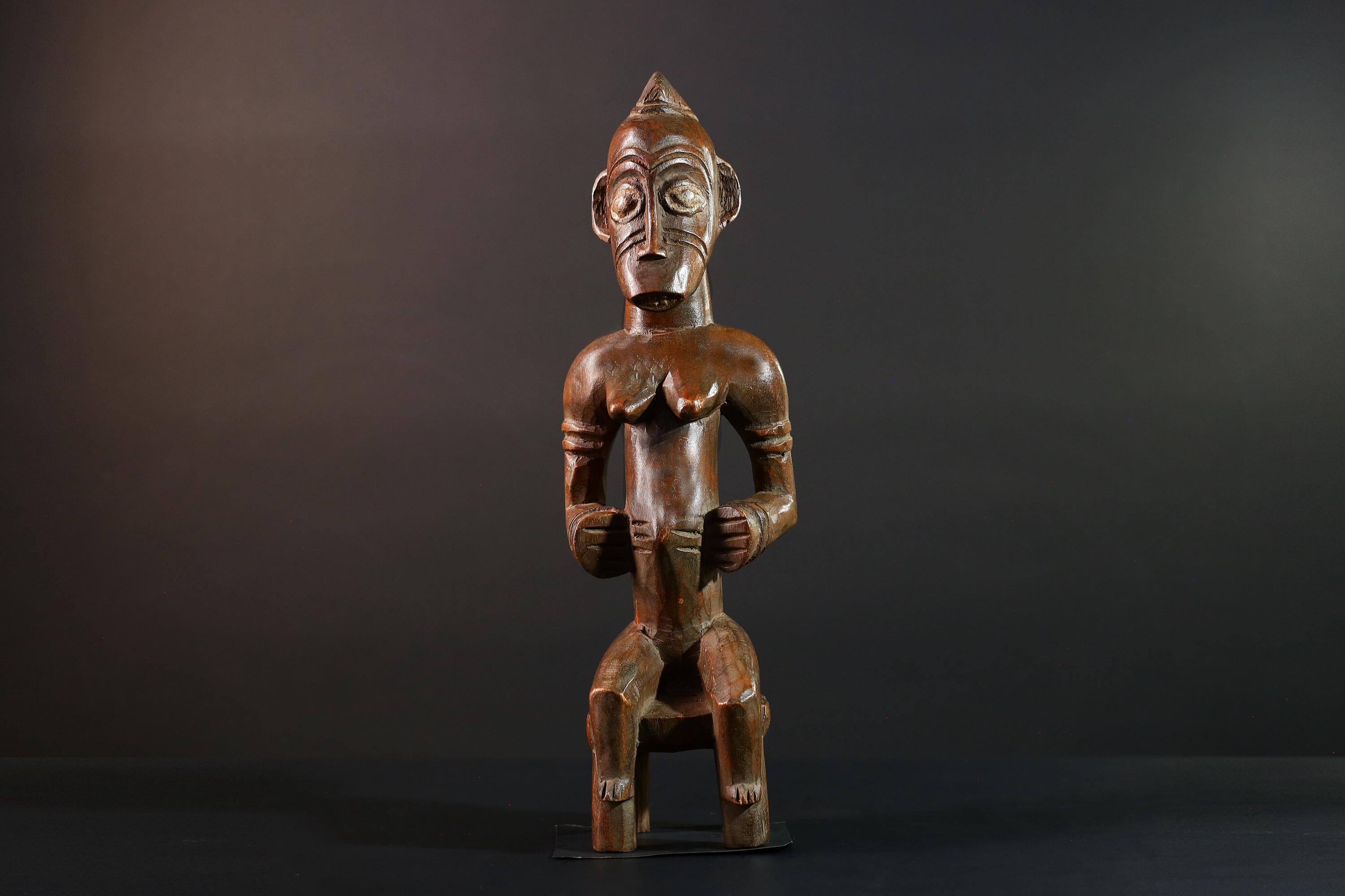 African Yoruba female figure seated on stool carved tribal fertility sculpture from Nigeria altar decor spiritual wood art-G5640