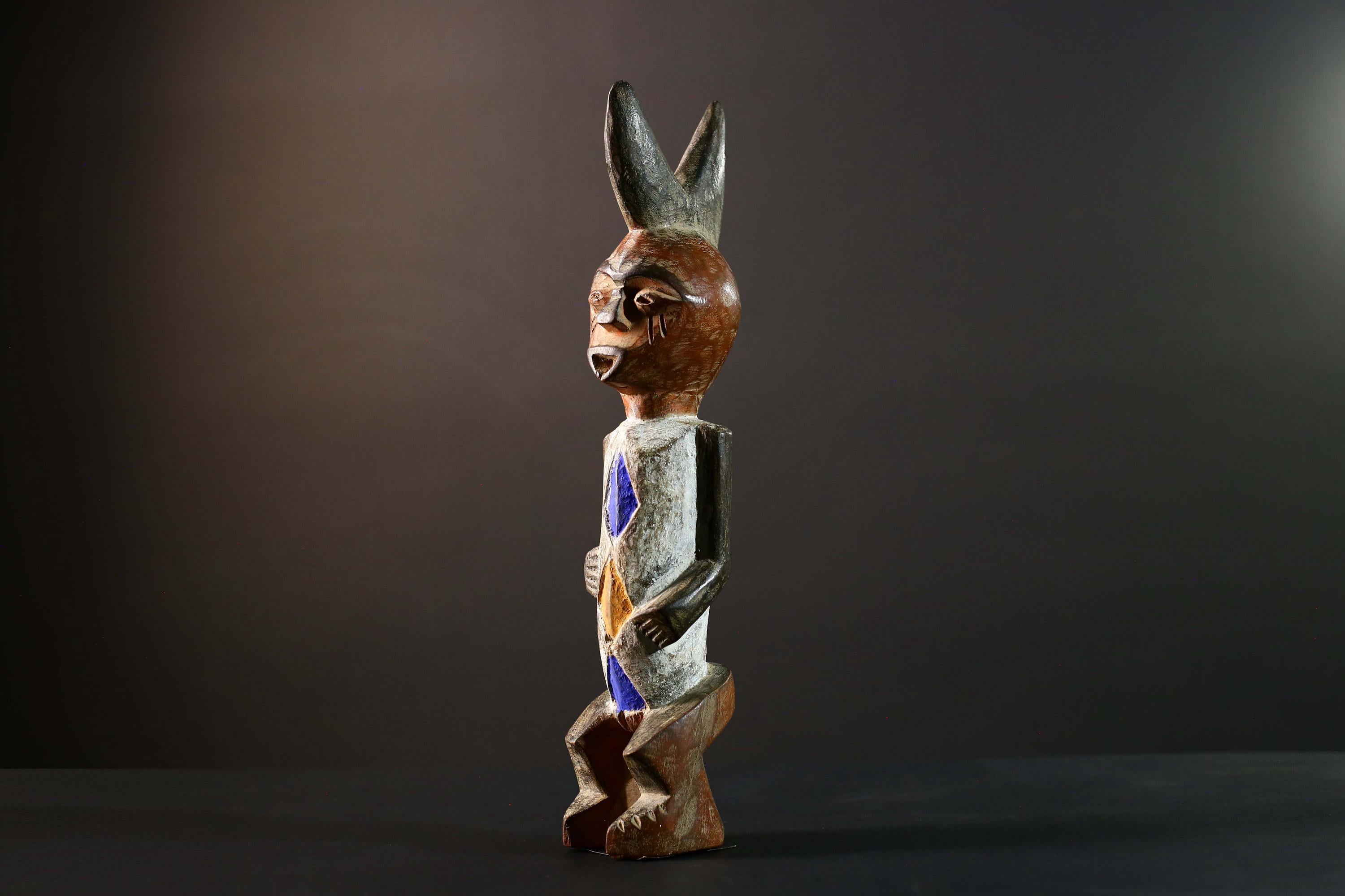 African Tribal Figure Hand Carved Wood Statue with Geometric Painted Patterns Blue Yellow Brown Ethnic Art Sculpture Home Decor-G5789