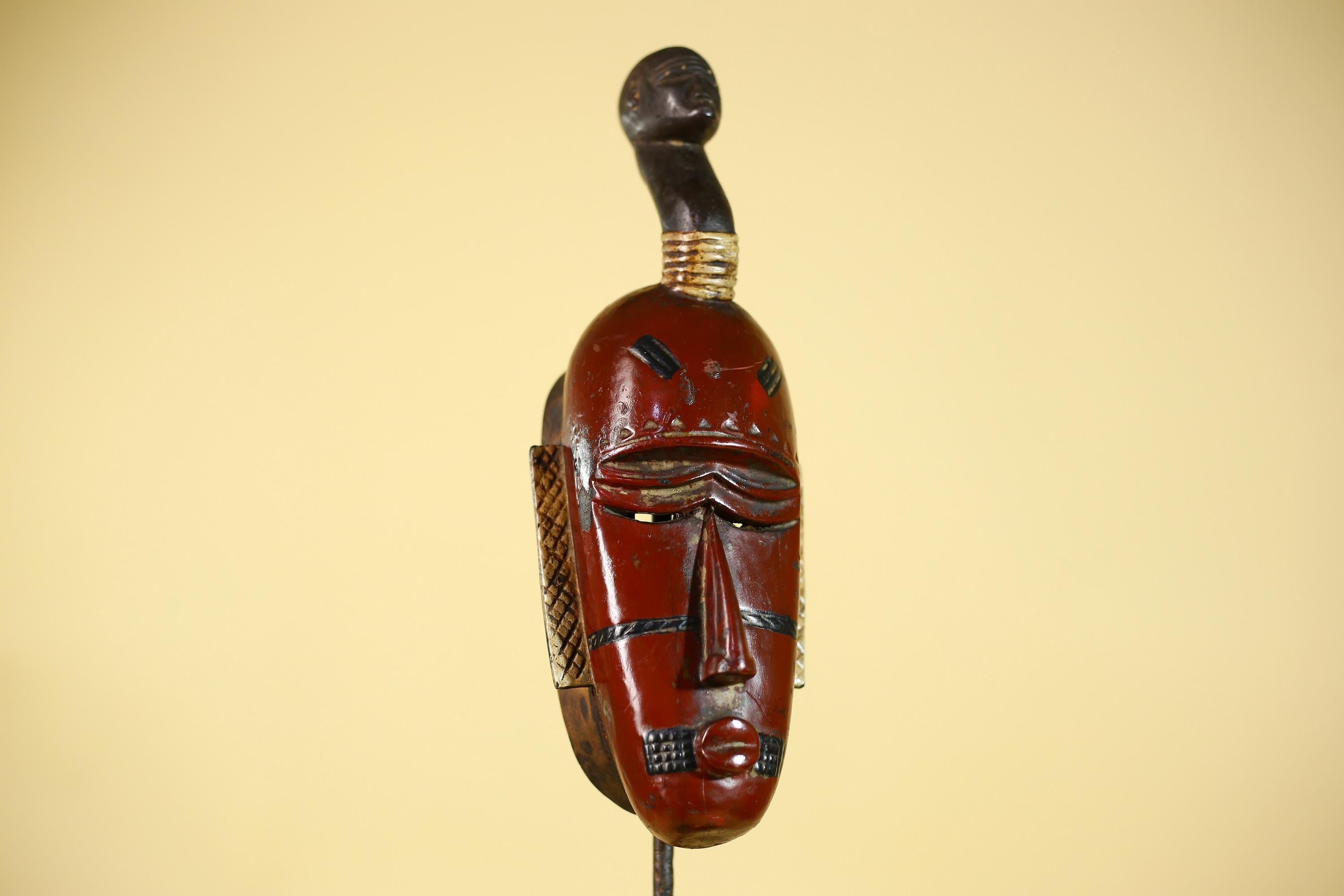 African Wooden Guro Mask with Elongated Face and Traditional Carved Details-G6152