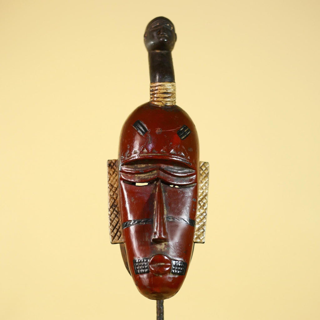 African Wooden Guro Mask with Elongated Face and Traditional Carved Details-G6152