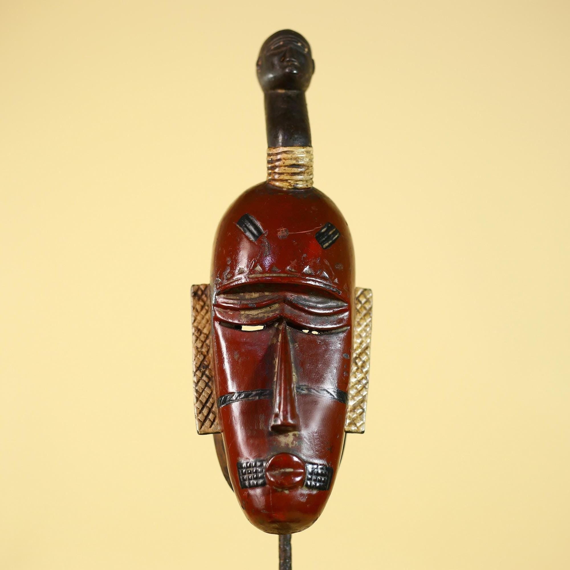 African Wooden Guro Mask with Elongated Face and Traditional Carved Details-G6152