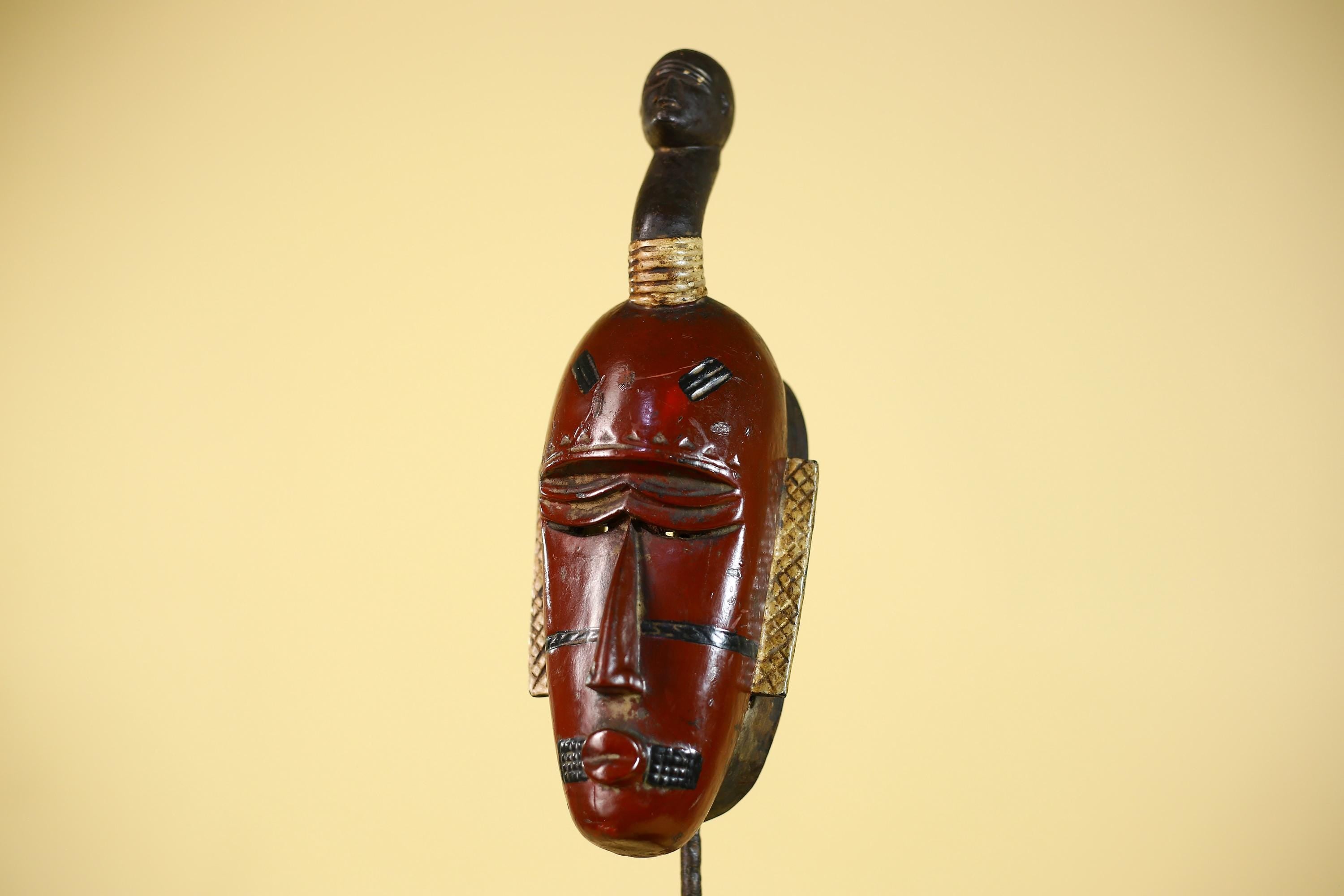 African Wooden Guro Mask with Elongated Face and Traditional Carved Details-G6152