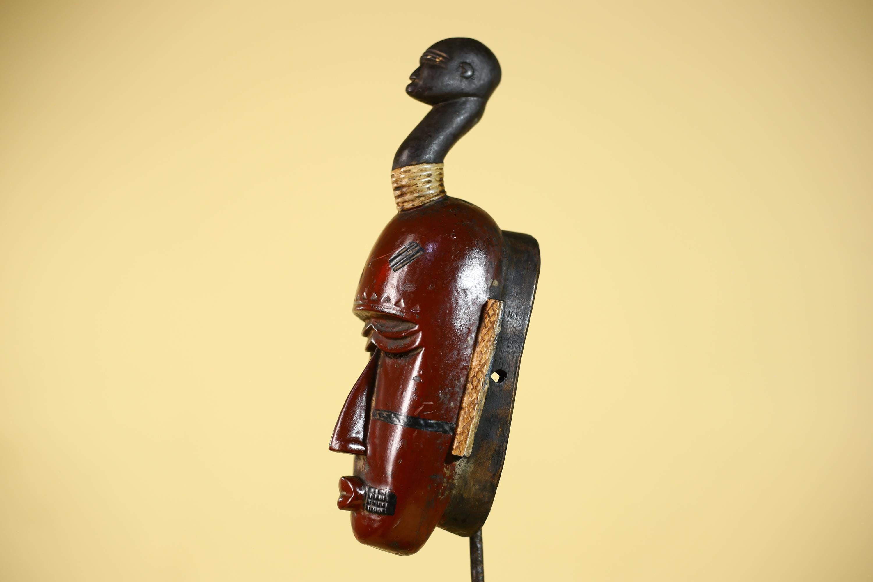 African Wooden Guro Mask with Elongated Face and Traditional Carved Details-G6152
