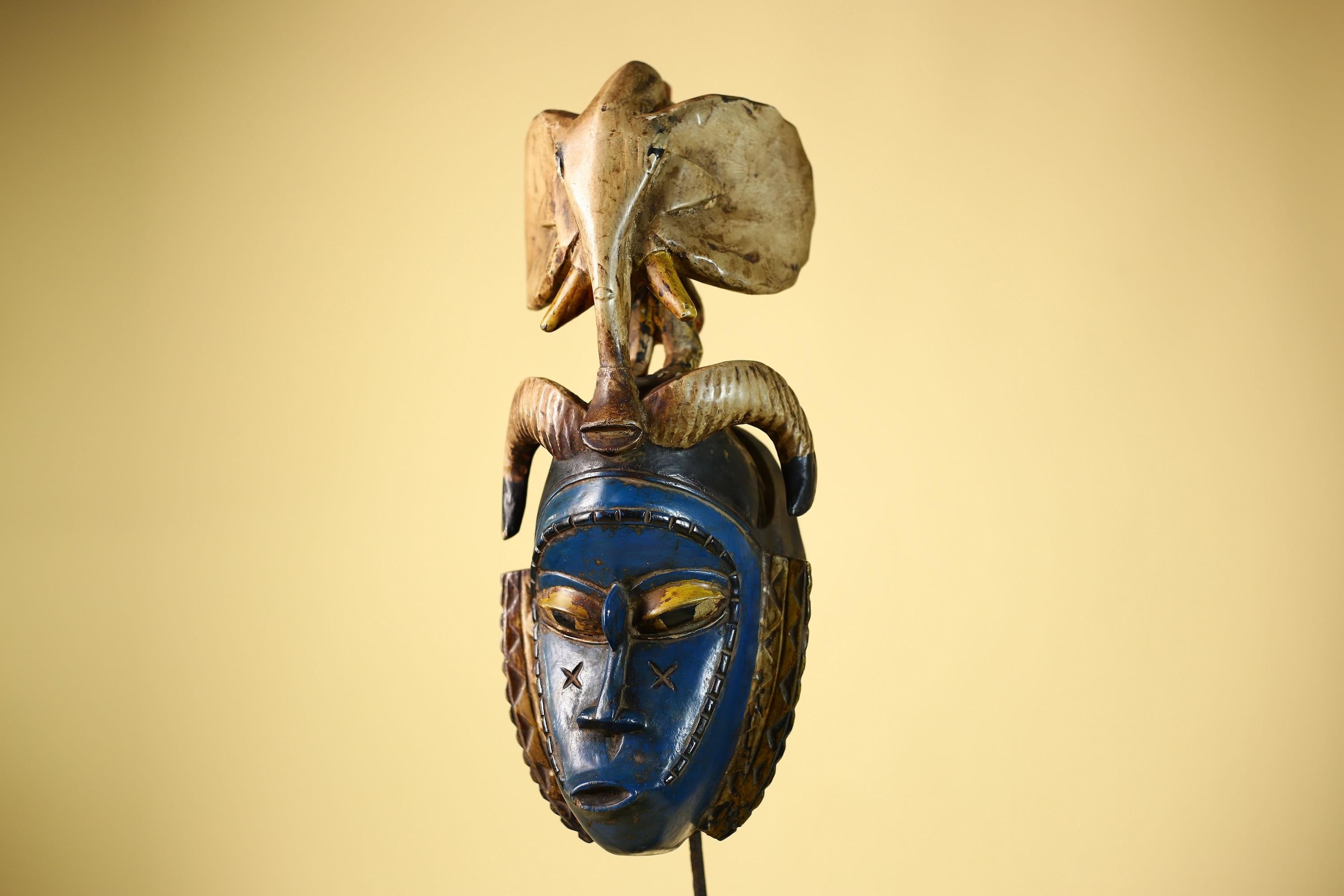 Handmade Guro Tribal Art Blue Face Decor with Elephant & Horn Accents-G6066