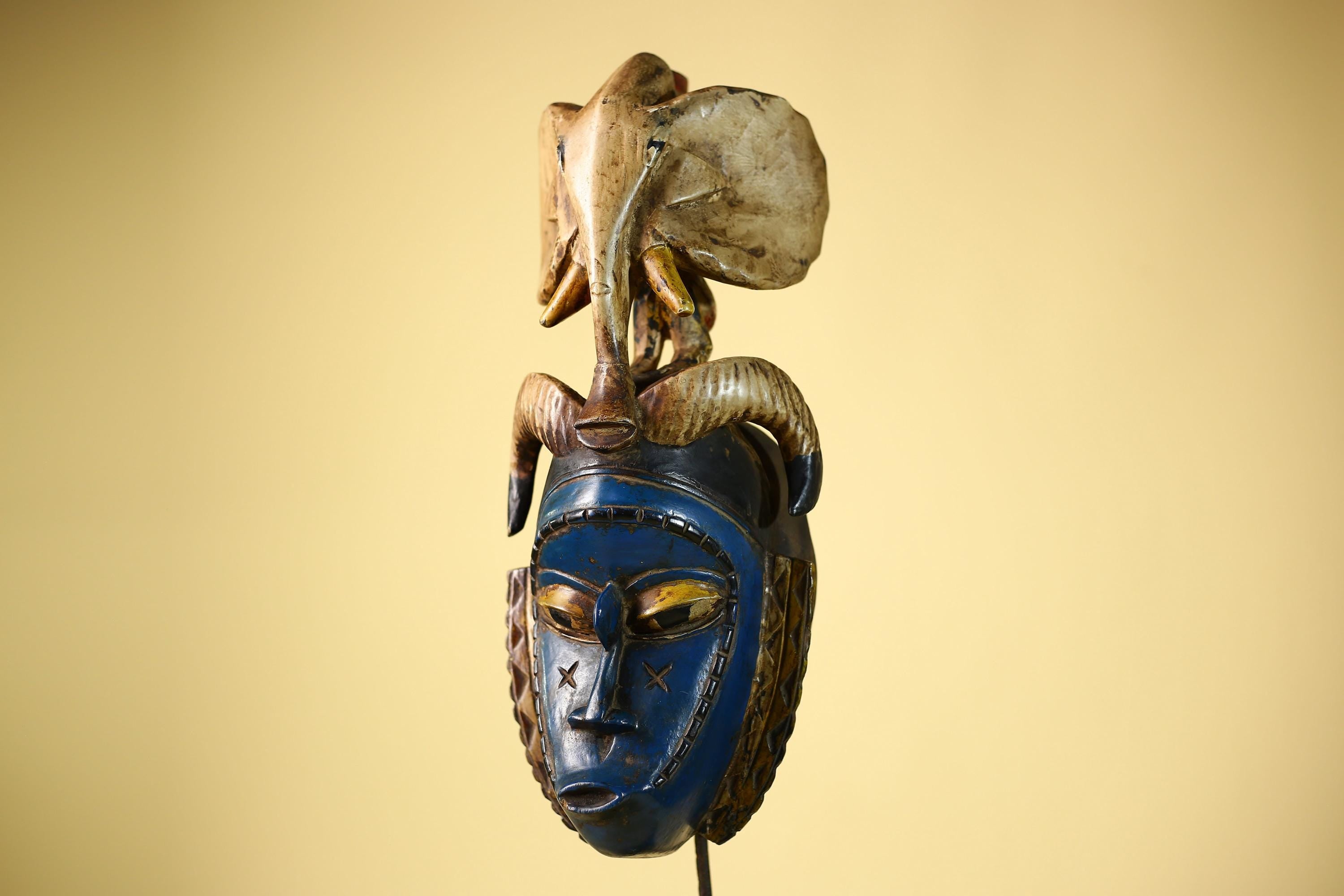 Handmade Guro Tribal Art Blue Face Decor with Elephant & Horn Accents-G6066