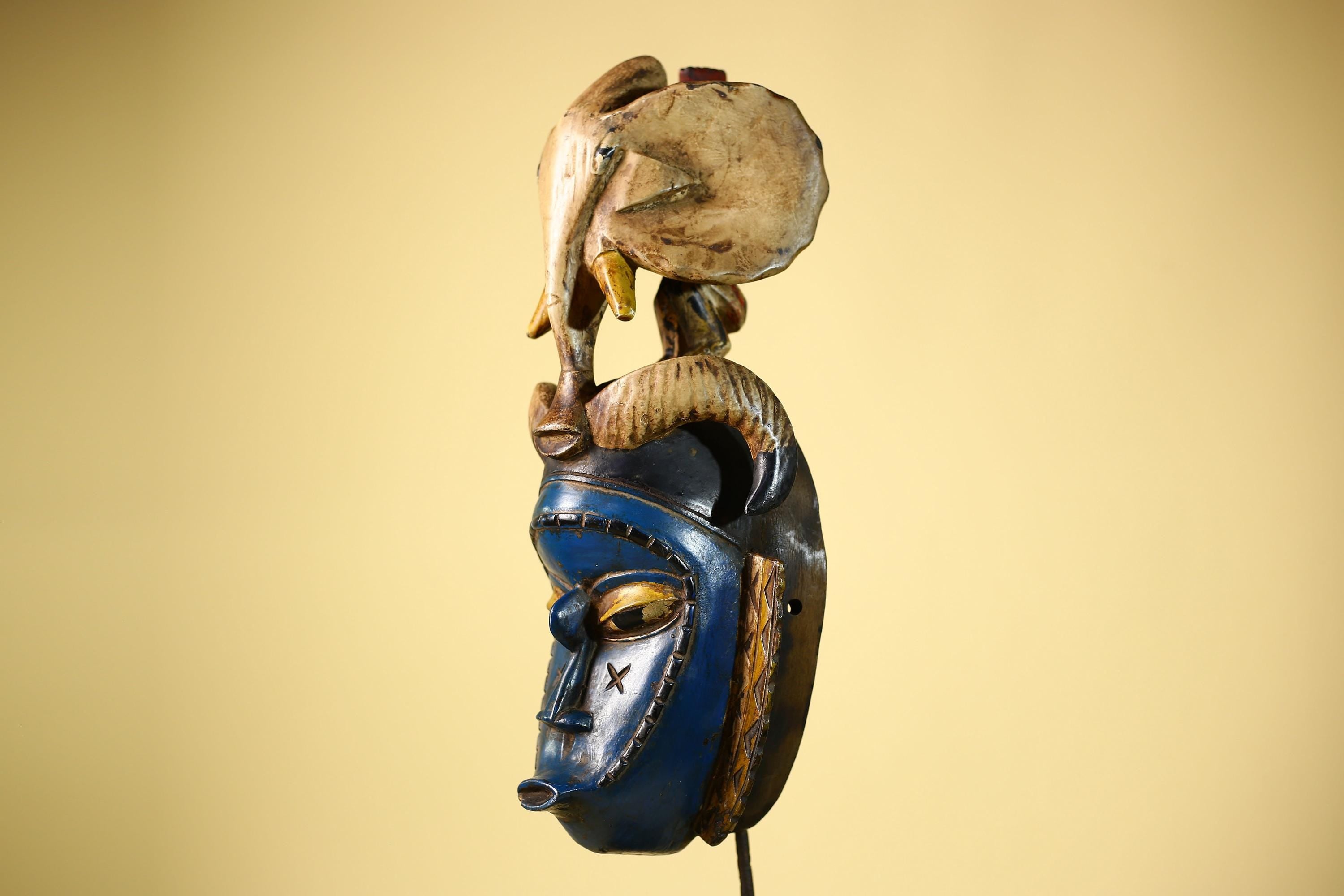 Handmade Guro Tribal Art Blue Face Decor with Elephant & Horn Accents-G6066