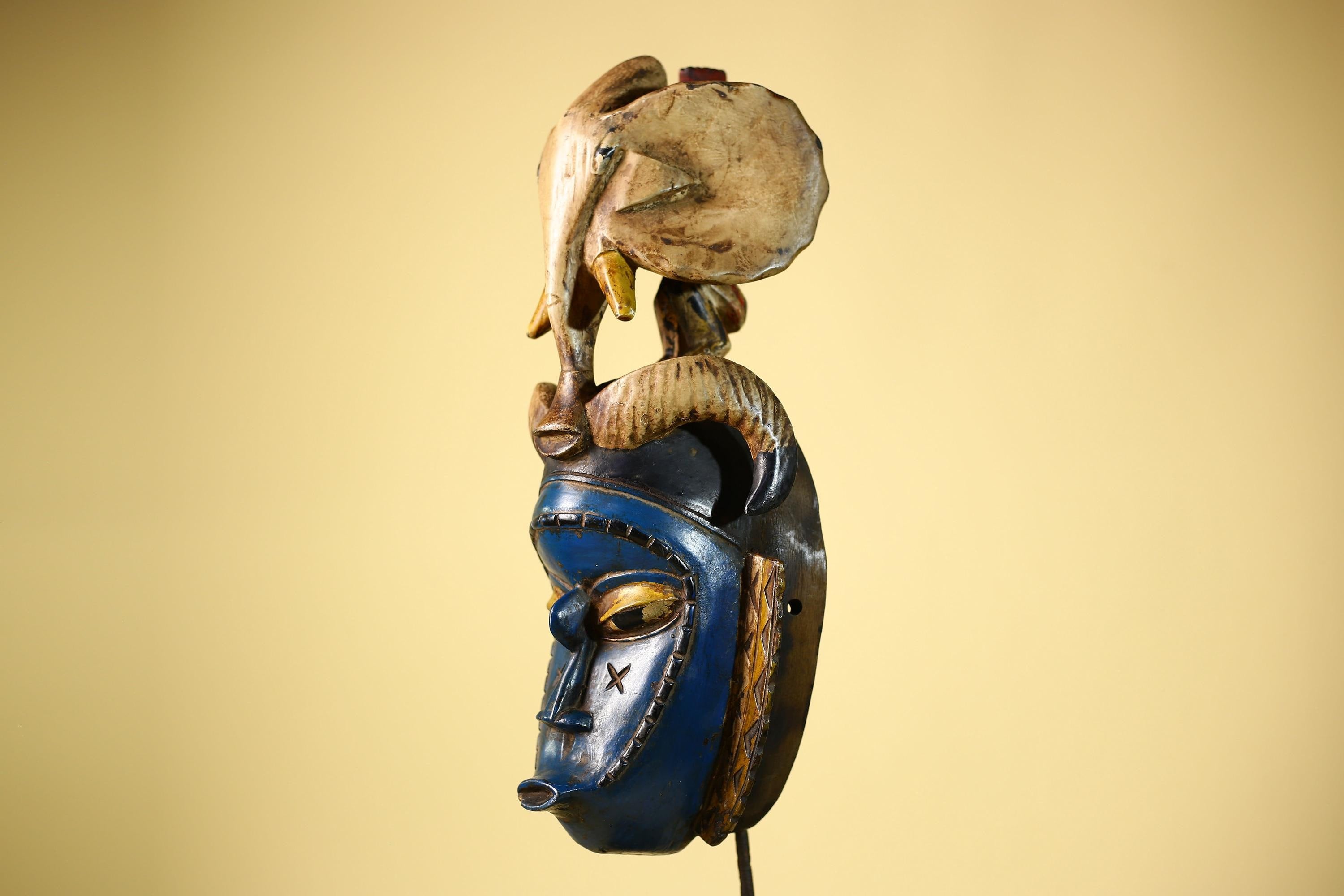 Handmade Guro Tribal Art Blue Face Decor with Elephant & Horn Accents-G6066