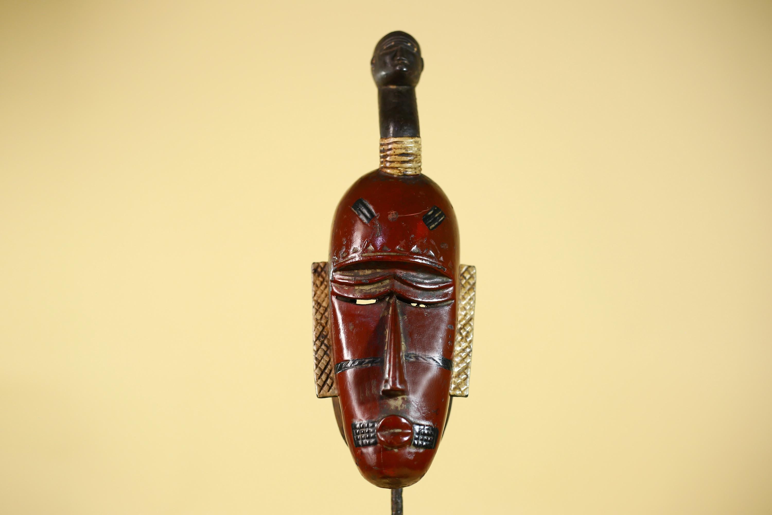 African Wooden Guro Mask with Elongated Face and Traditional Carved Details-G6152