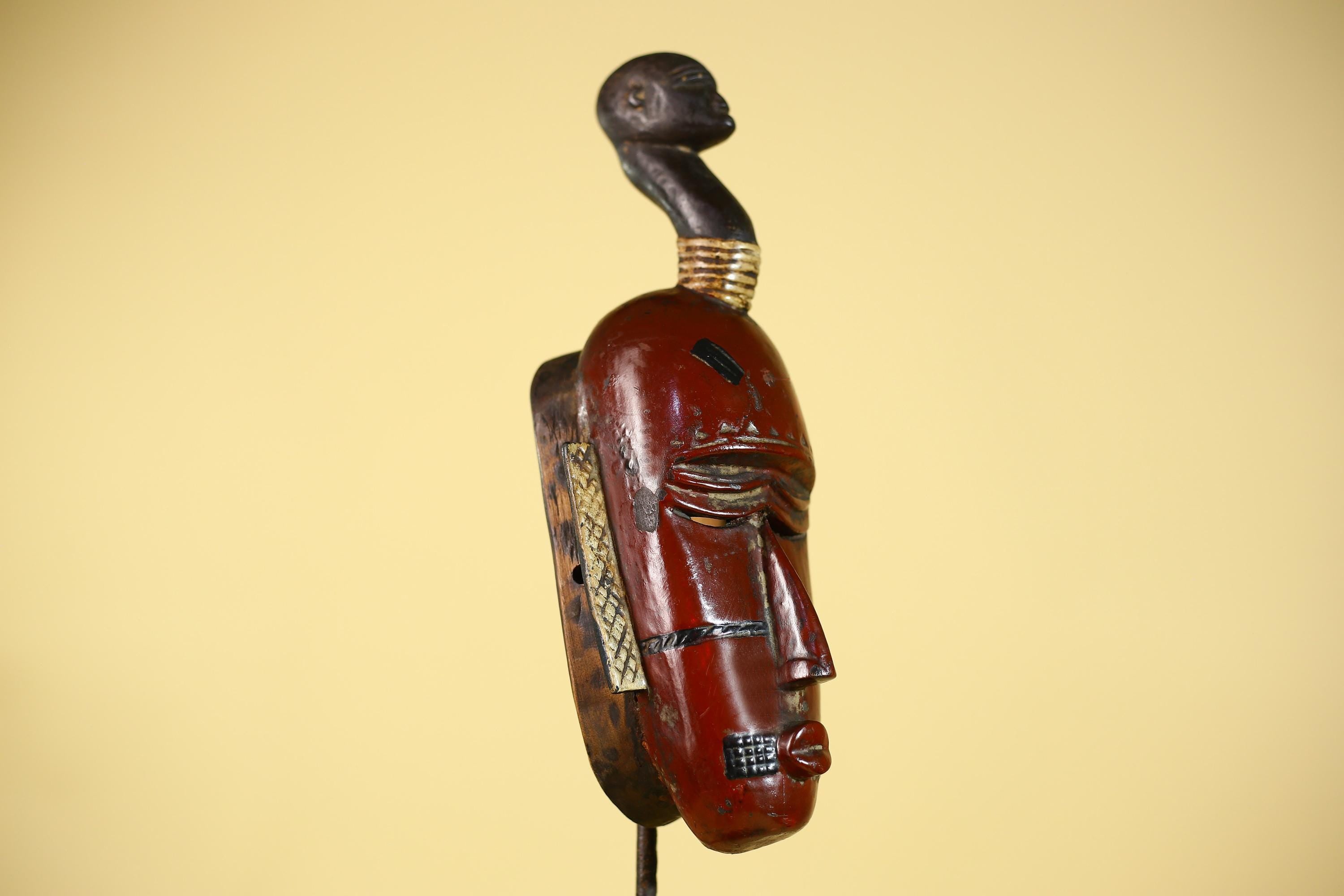 African Wooden Guro Mask with Elongated Face and Traditional Carved Details-G6152