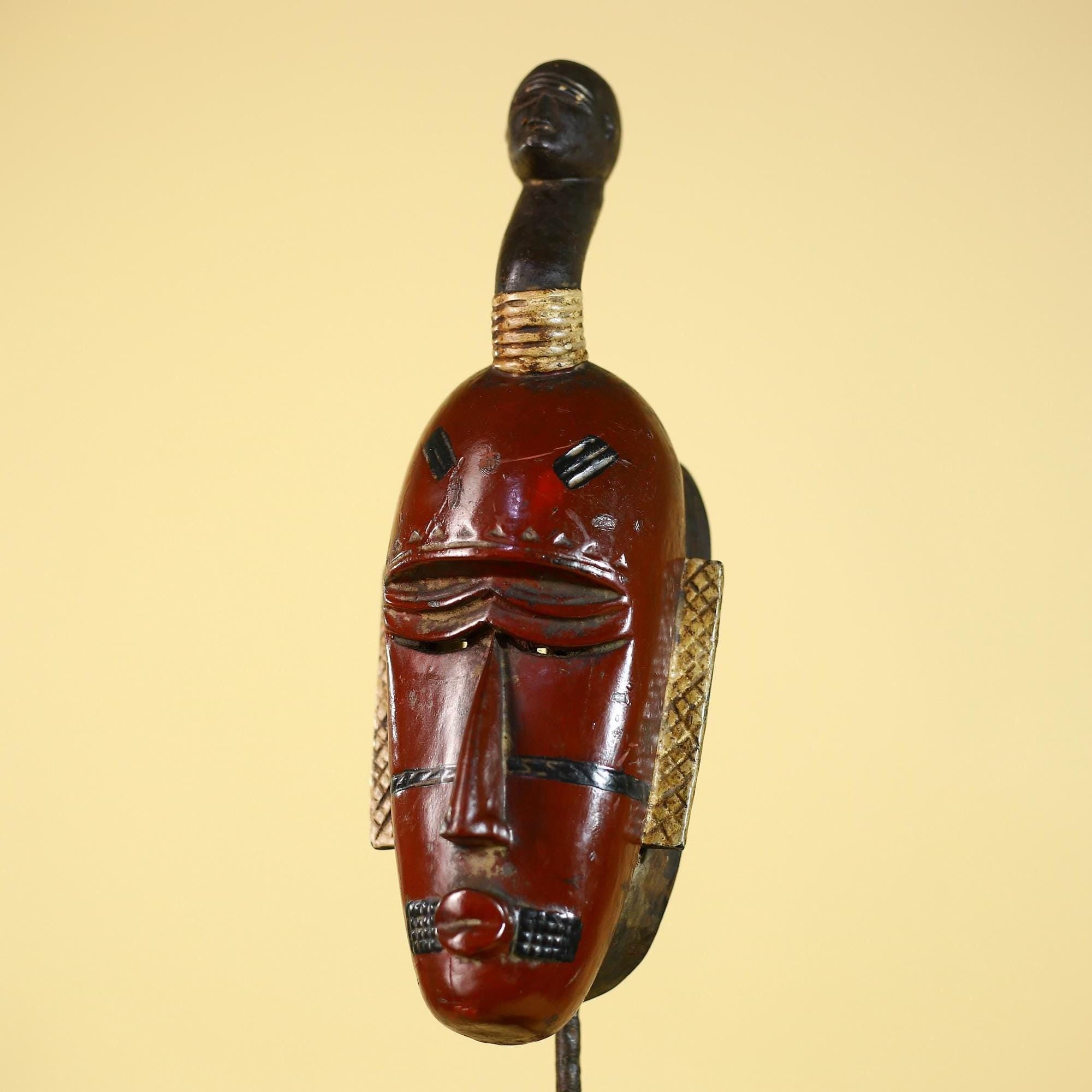 African Wooden Guro Mask with Elongated Face and Traditional Carved Details-G6152