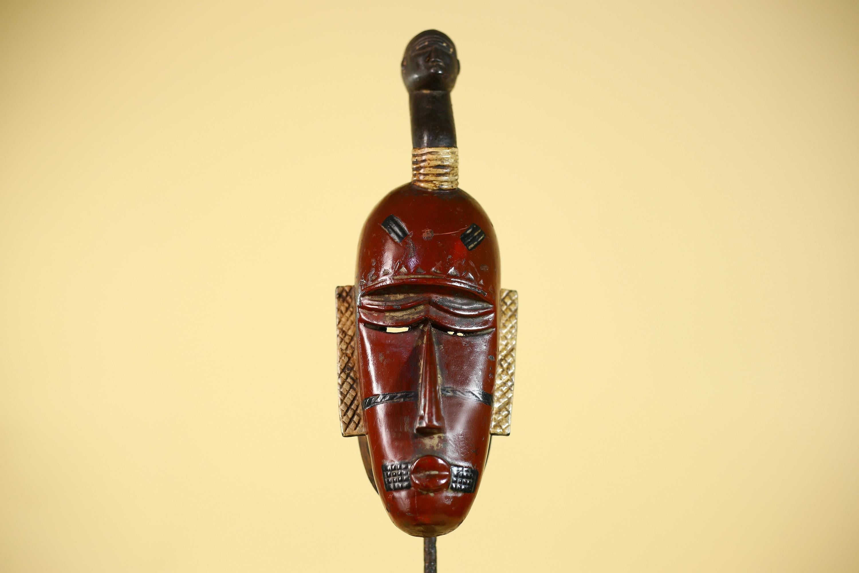 African Wooden Guro Mask with Elongated Face and Traditional Carved Details-G6152