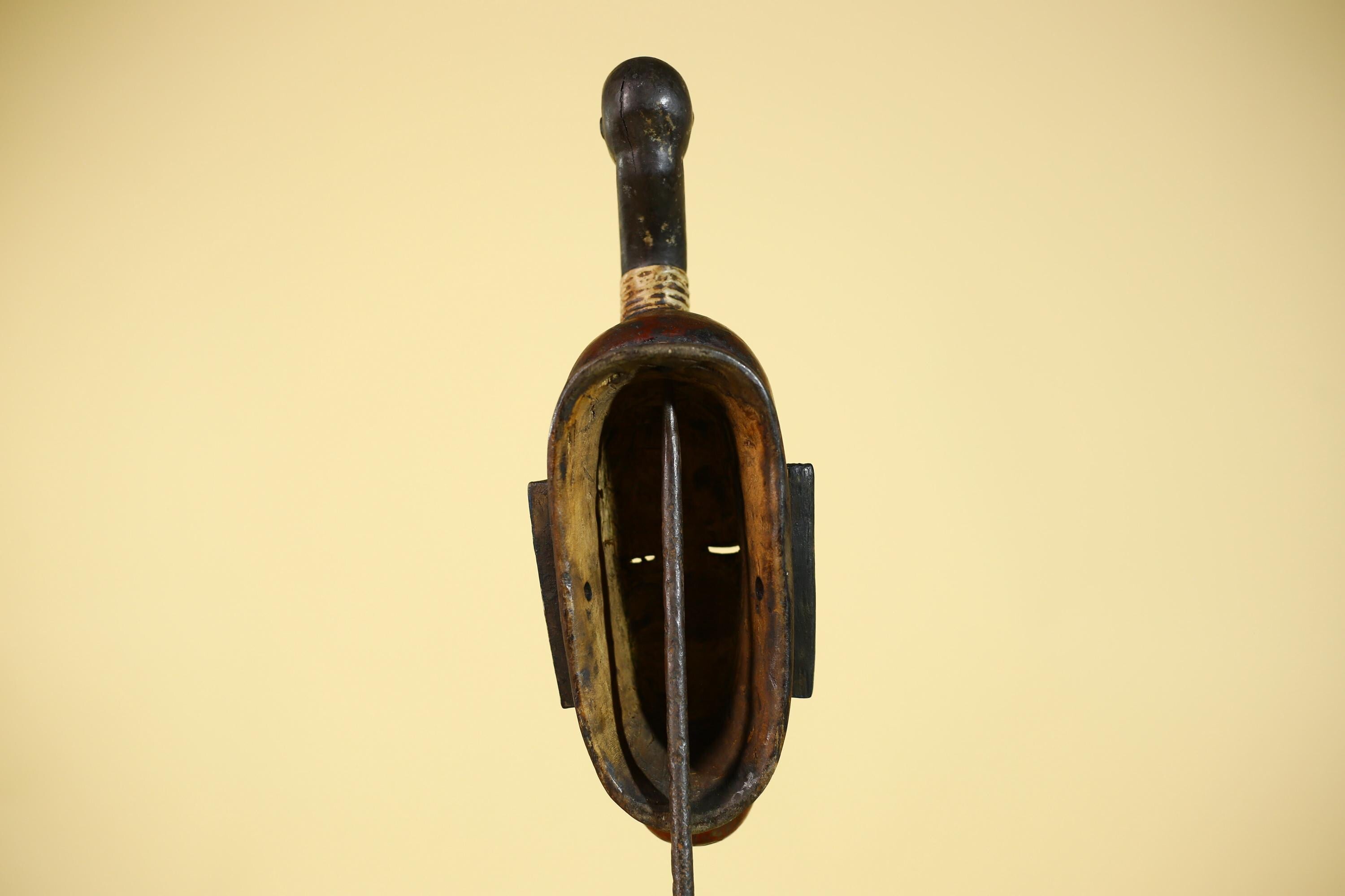 African Wooden Guro Mask with Elongated Face and Traditional Carved Details-G6152
