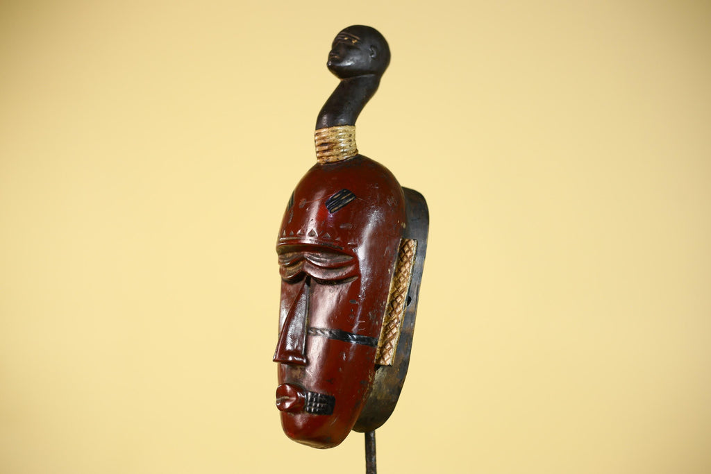 African Wooden Guro Mask with Elongated Face and Traditional Carved Details-G6152