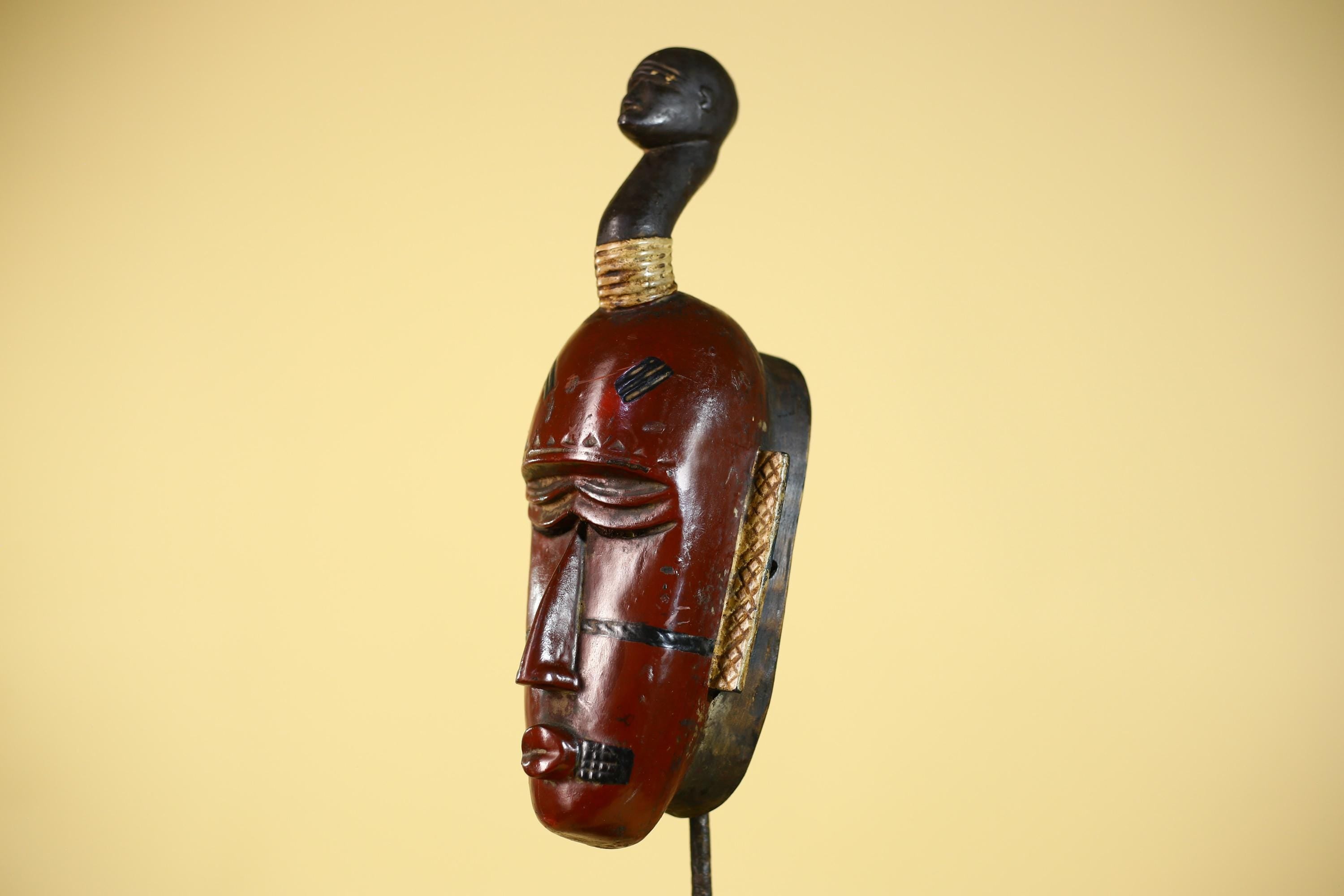 African Wooden Guro Mask with Elongated Face and Traditional Carved Details-G6152