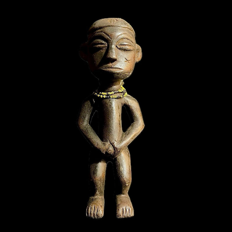 wooden figures depicts an African Yoruba African Statue